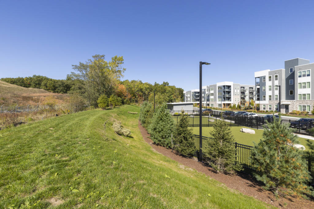 land engineering at 316 Station Woburn showing grassy hill and building and light pole