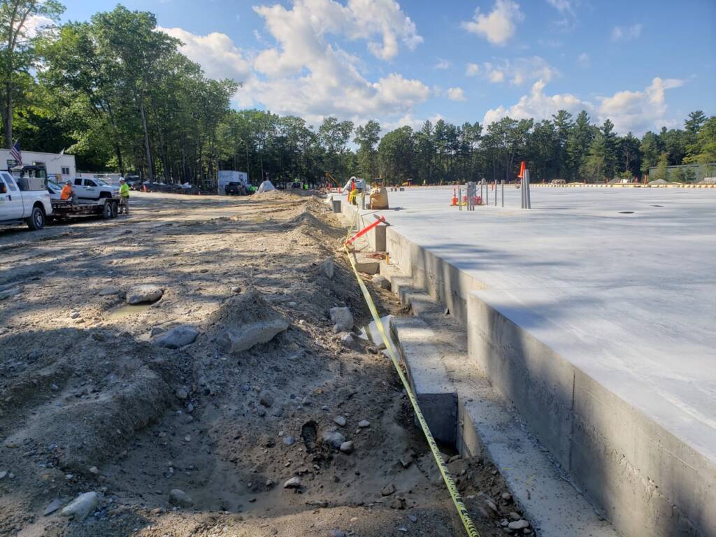 50 Nagog Park Acton MA lay foundation on dirt construction site