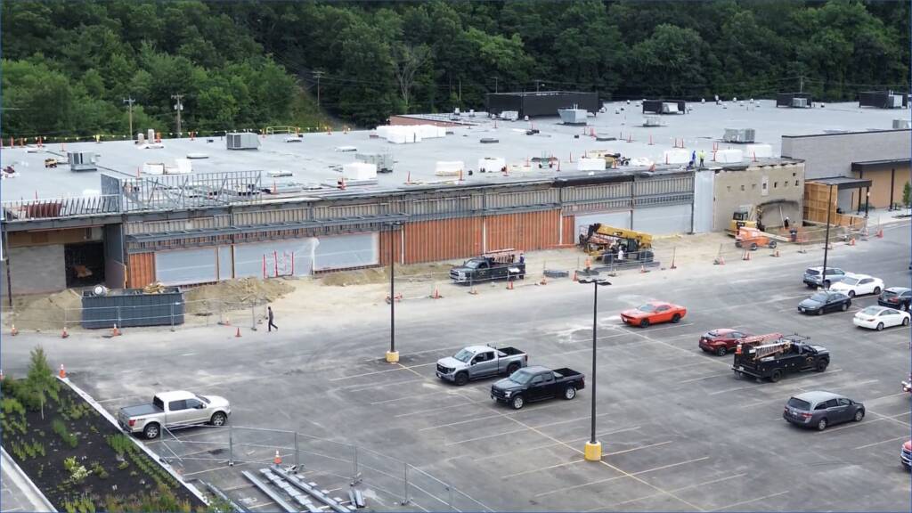 Market Basket aerial of construction with workers and building
