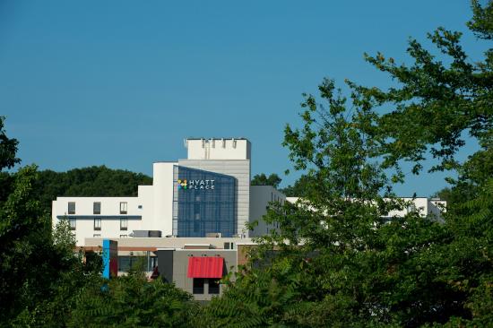 View of the completed Hyatt Place hotel building surrounded by landscaping in Braintree.