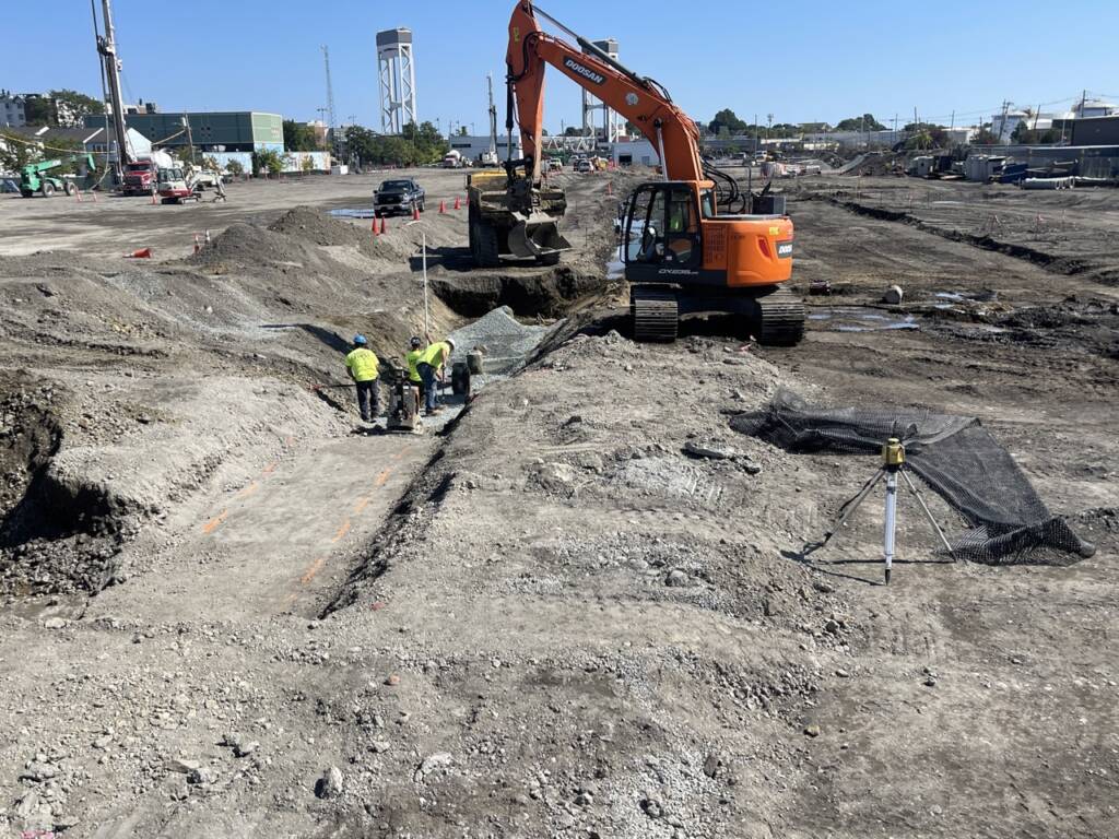 Underground utility installation and trench work underway at Chelsea Point in Franklin, MA
