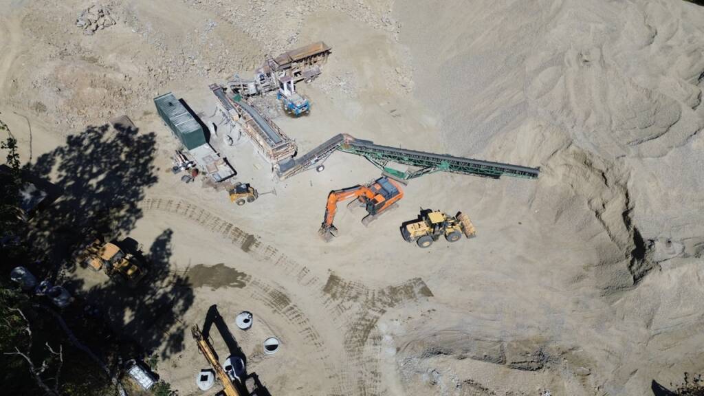 Drone view of large-scale earthwork and site preparation for Franklin Grove Apartments at 121 Grove Street in Franklin, MA.